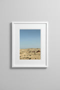 A4 framed Agafay Desert fine art print hung on a neutral wall 