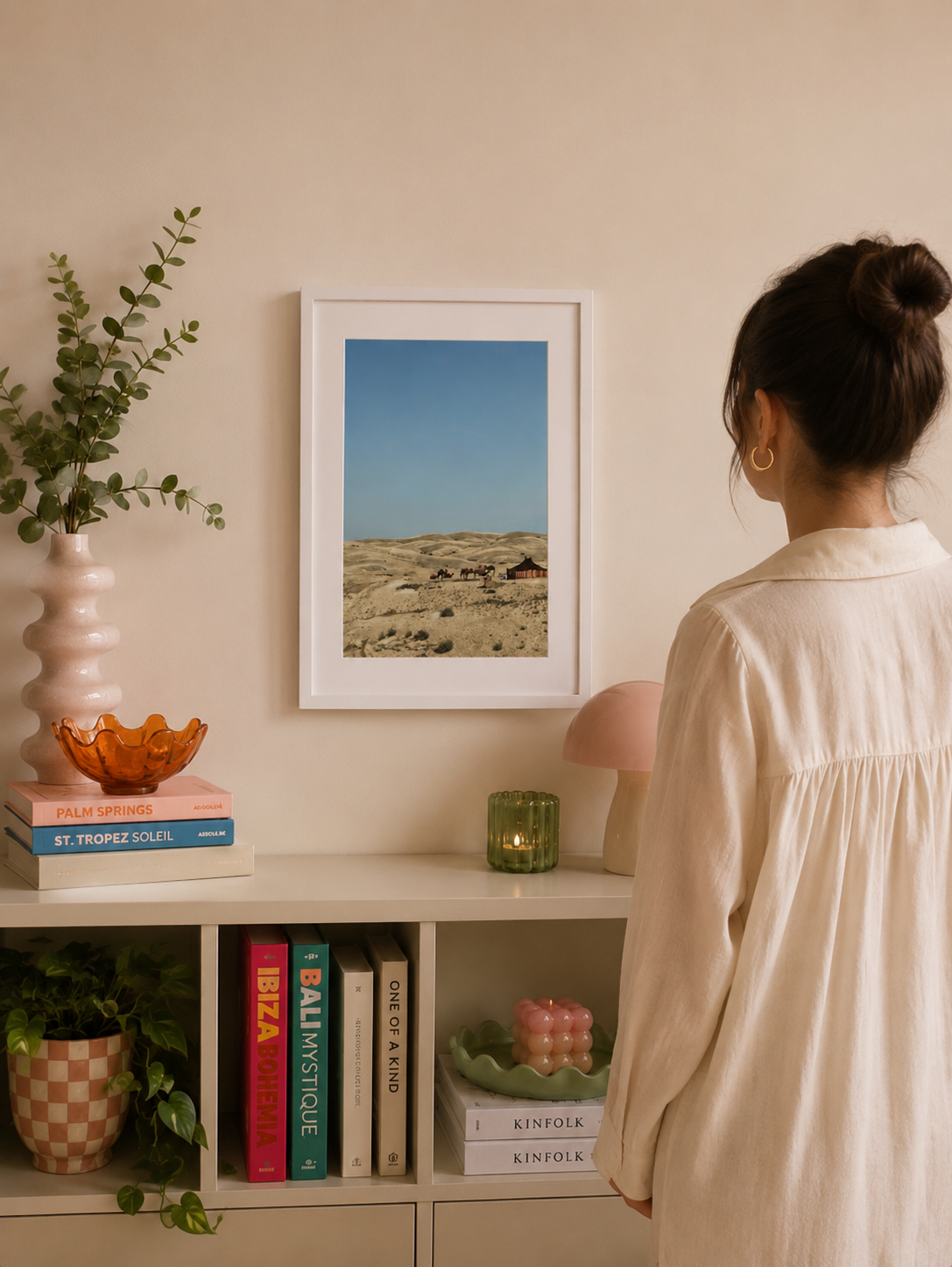 A3 Agafay Desert print framed on a wall beside a woman for scale