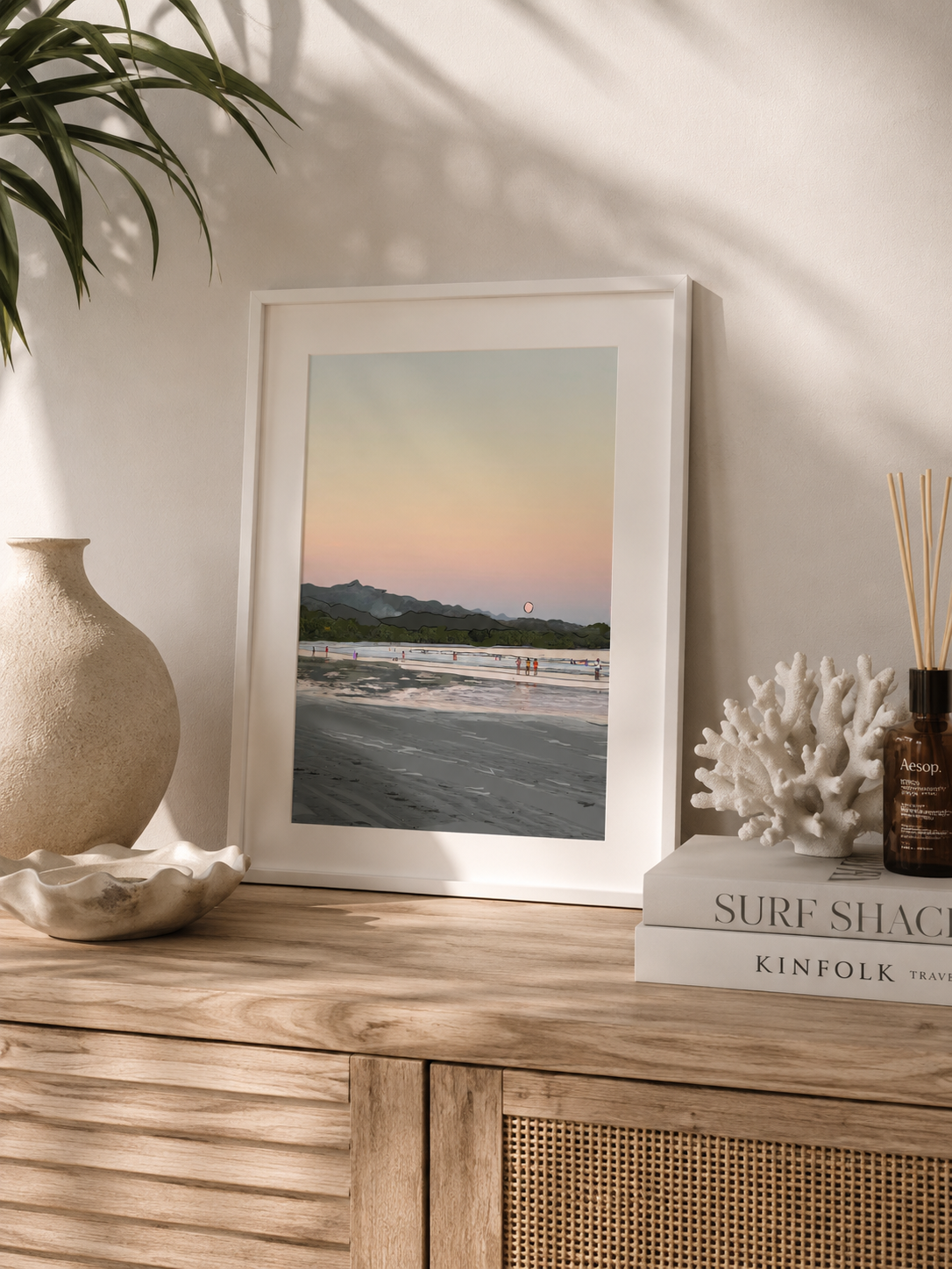 A3 Costa Rica print styled on a wooden console table with coastal décor