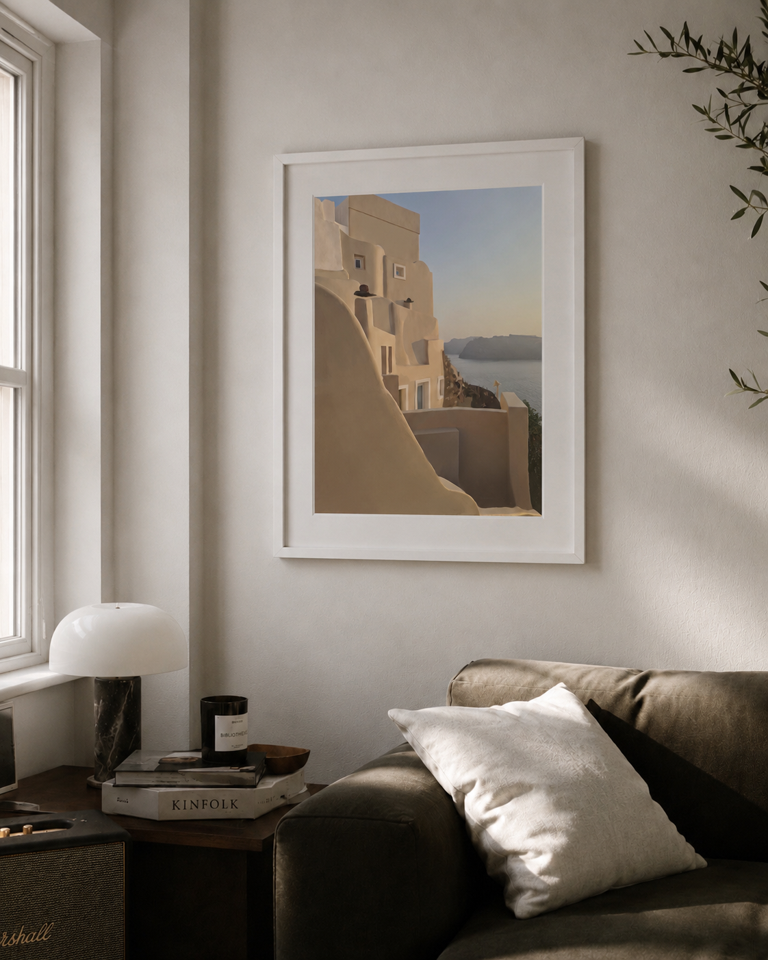 A3 Oia Santorini print framed in a cosy living room by a window