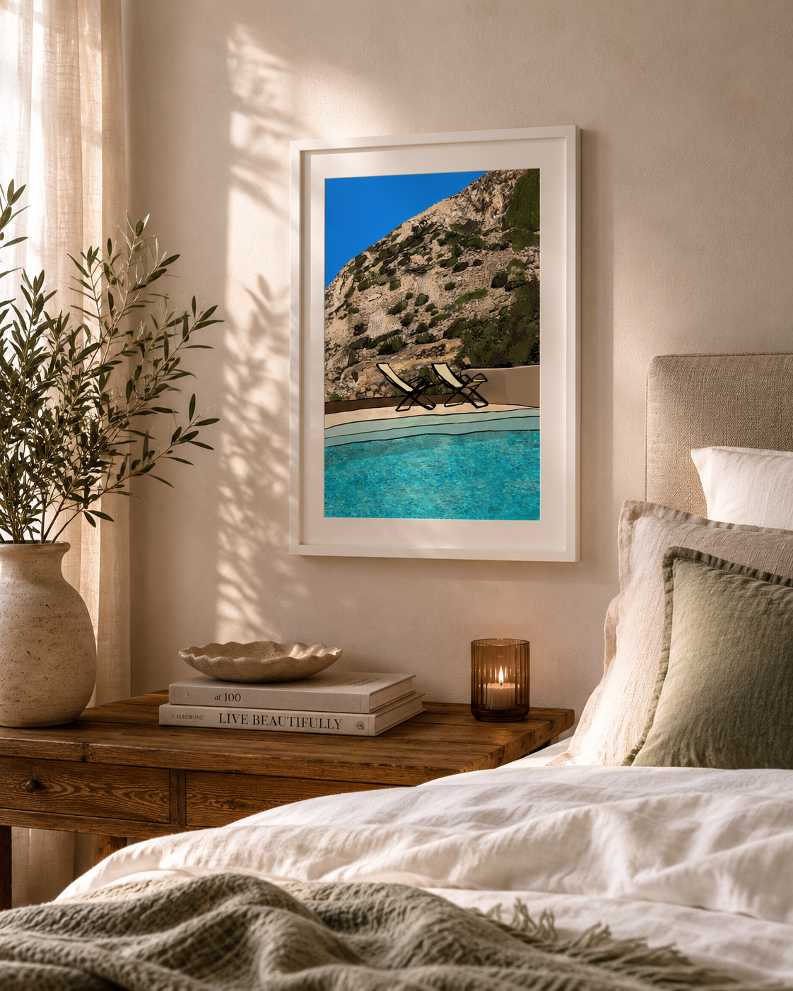 A3 Sifnos Chairs print framed above a bed in a cosy bedroom