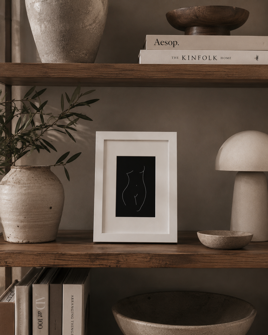 A5 Venus I print styled on a dark wooden shelf with vases