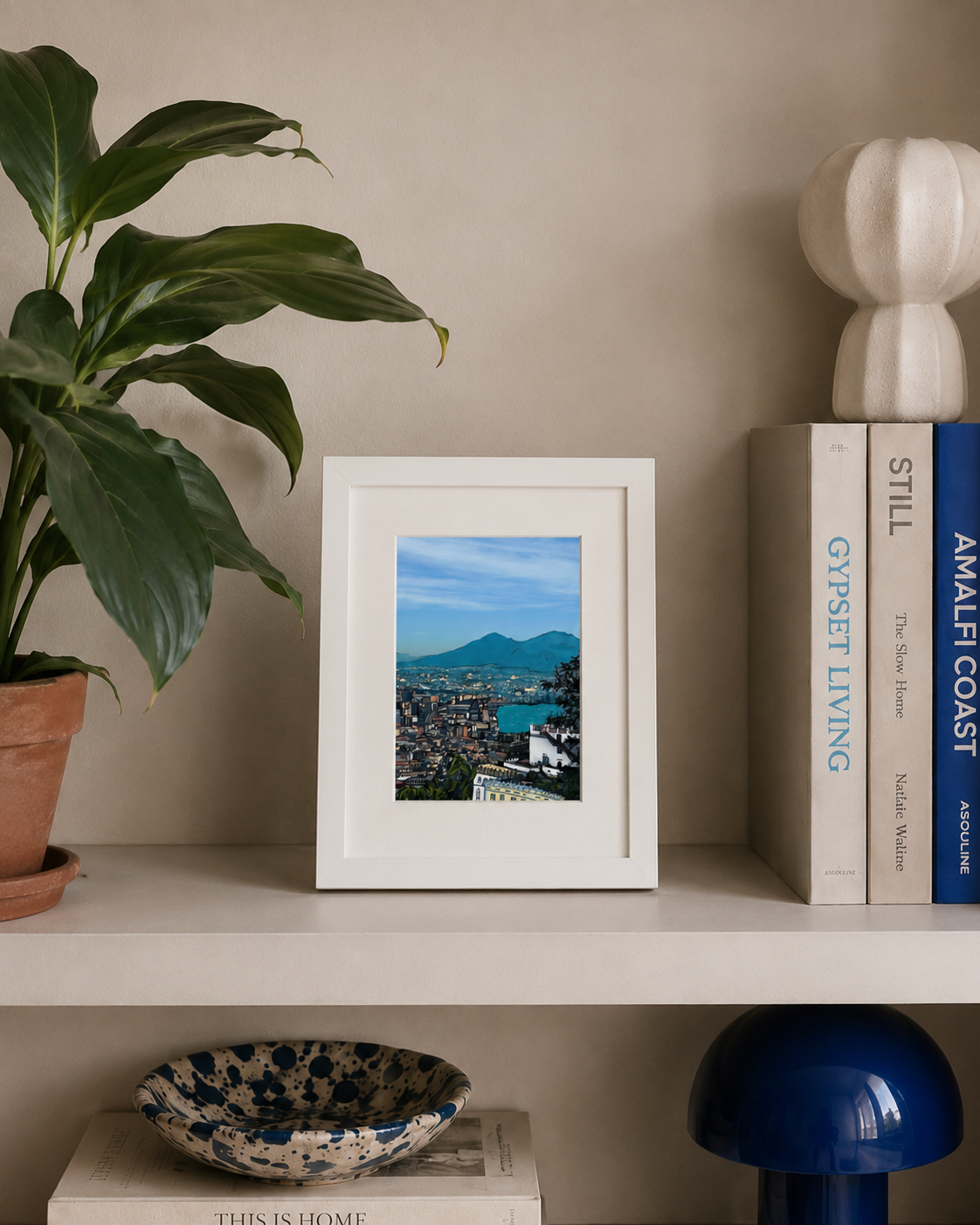 A5 framed Naples scenic Art print on shelf