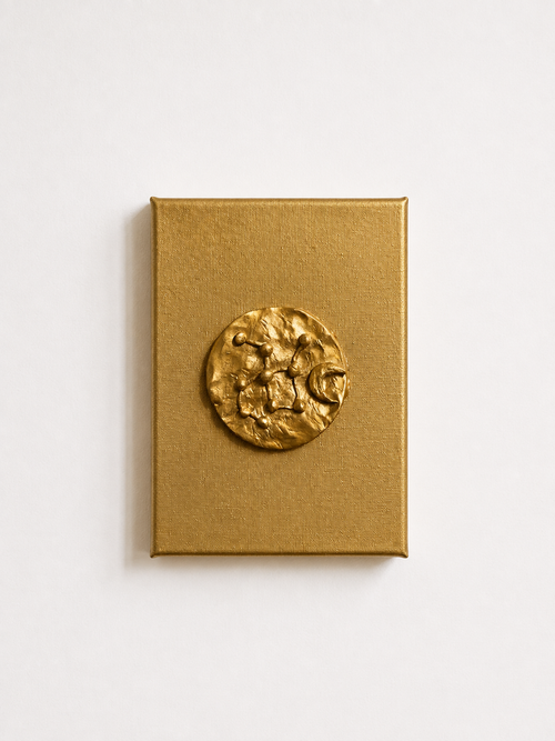 Astra ceramic art on gold canvas, raised metallic gold constellation design against white background