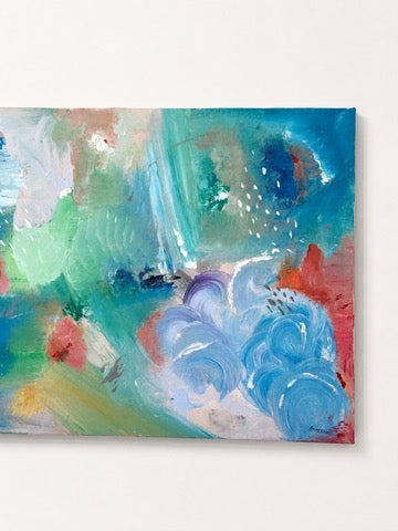 Cielo - blue, green and coral abstract acrylic painting on canvas, hanging on a wall, close up