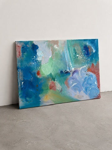 Cielo - blue, green and coral abstract acrylic painting on canvas, leaning on a wall