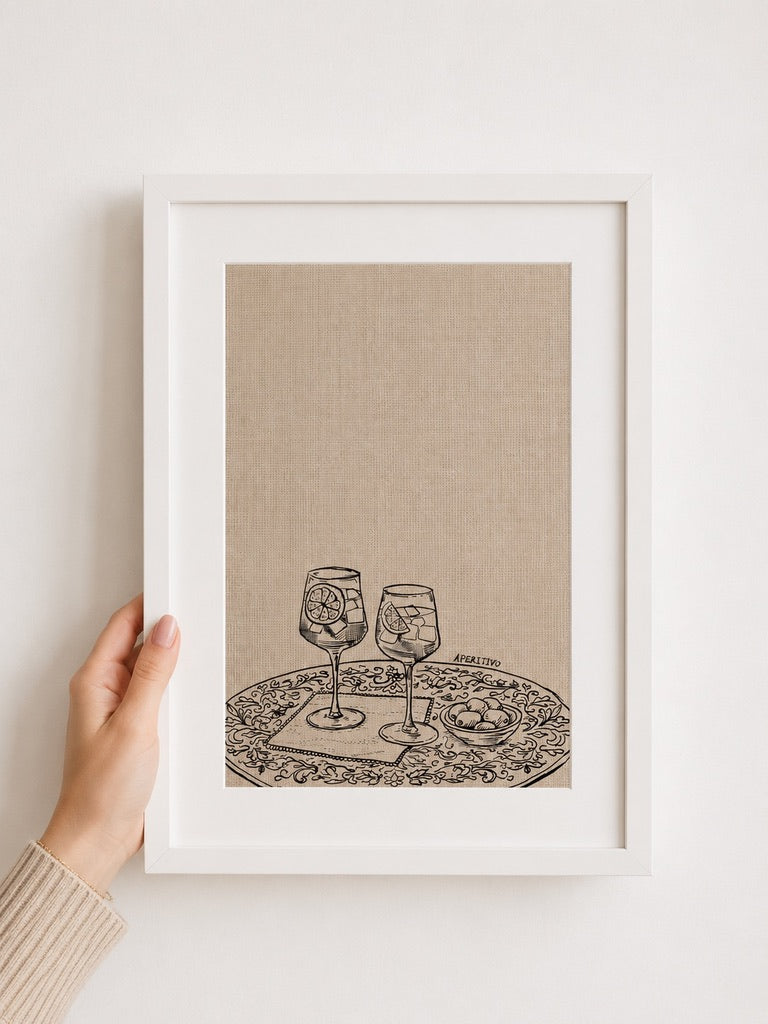 Framed Couple of Aperols print of aperitivo glasses held on a wall