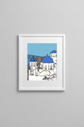 Framed Santorini print of blue-domed churches on a neutral wall