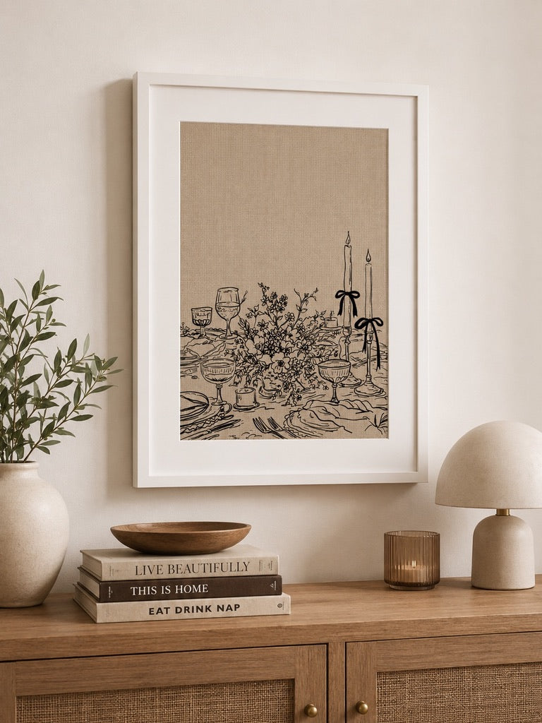 a3 Framed Dinner Party print of a candlelit table setting with flowers over a console table