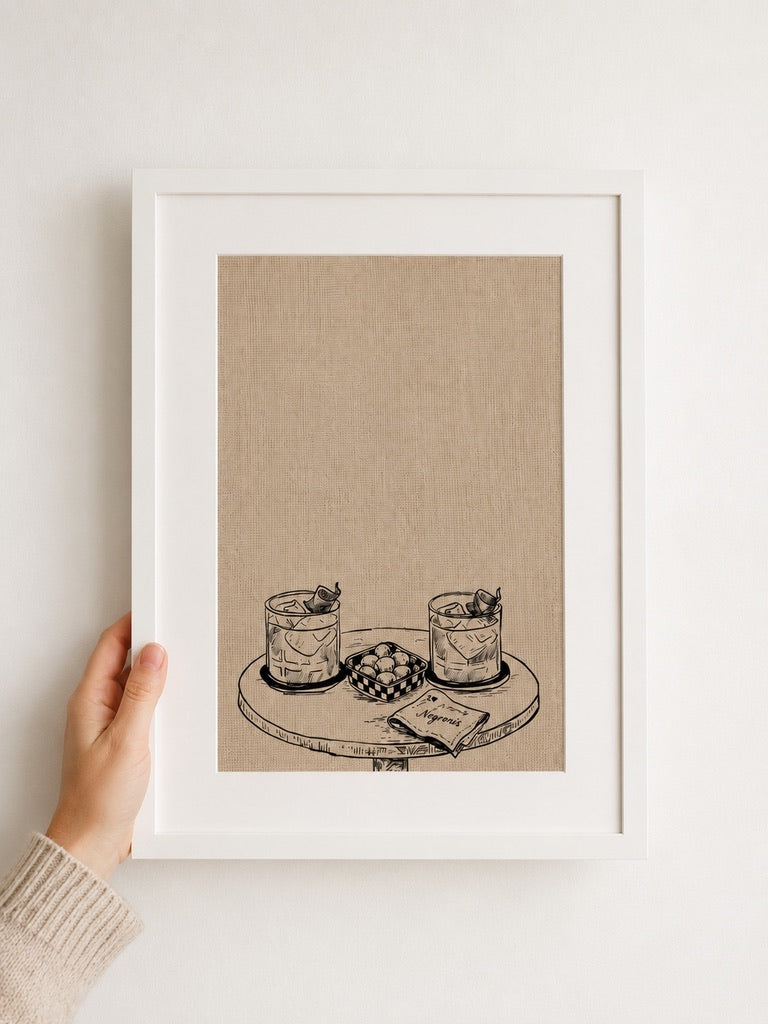 a3 framed Couple of Negronis print of cocktails on a console table