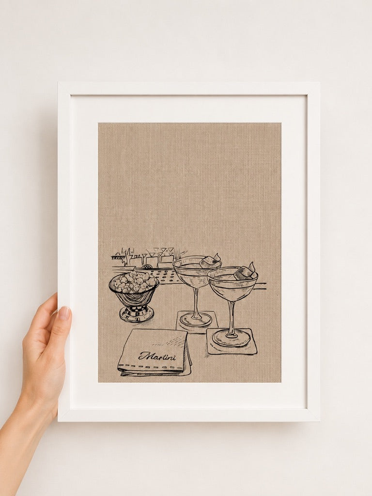 a4 Framed Couple of Martinis print of cocktail glasses on a wall