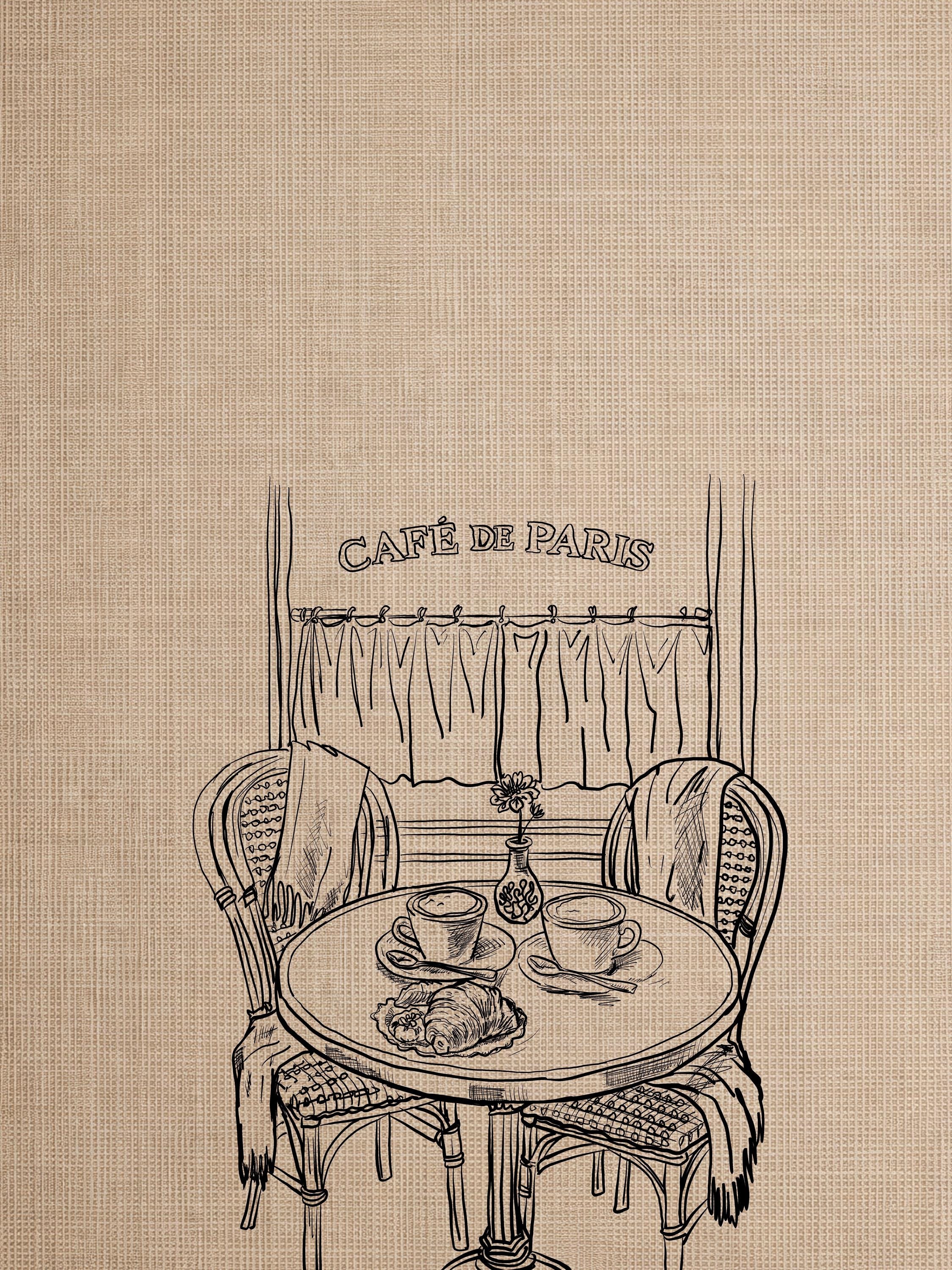 unframed Café de Paris print of a bistro table and chairs over a console table
